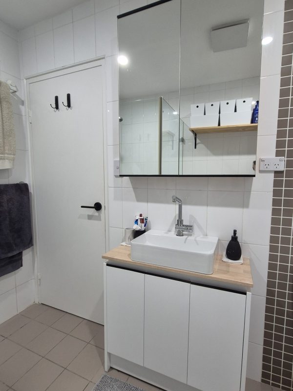 Custom vanity unit and mirror cabinet.