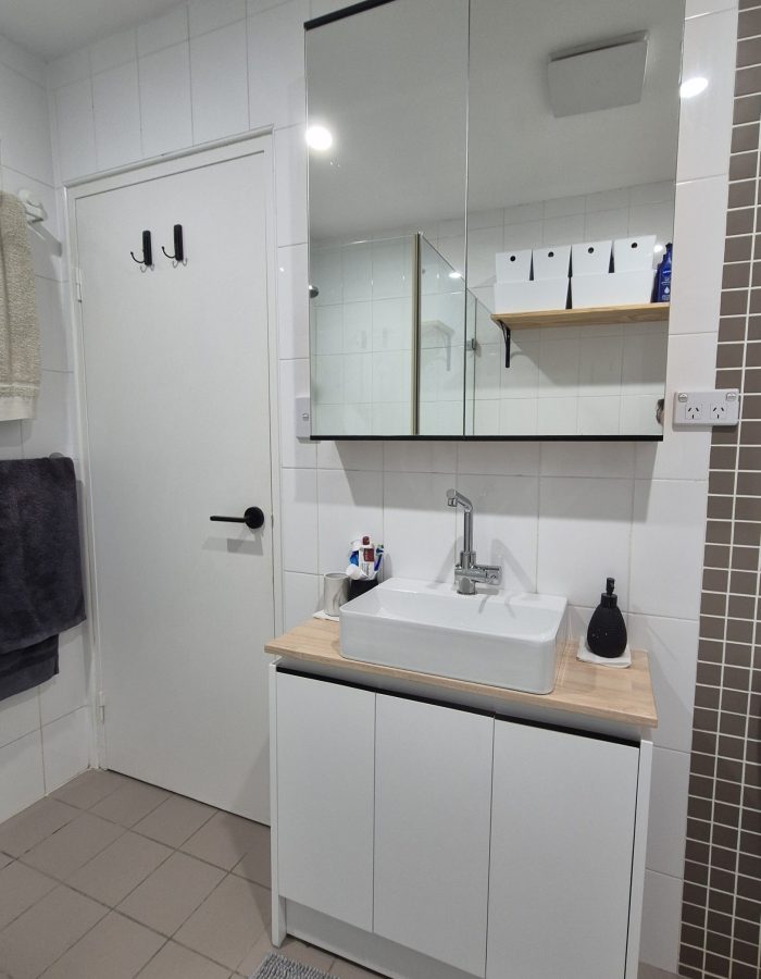 Custom vanity unit and mirror cabinet.