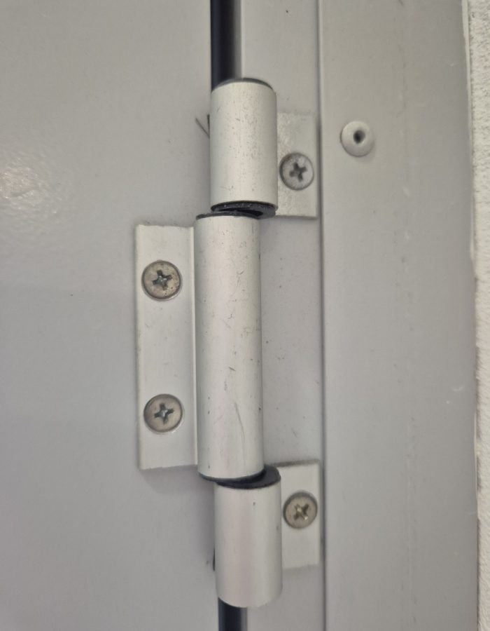 Repaired and adjusted common area door hinges to restore functionality and ensure smooth operation.